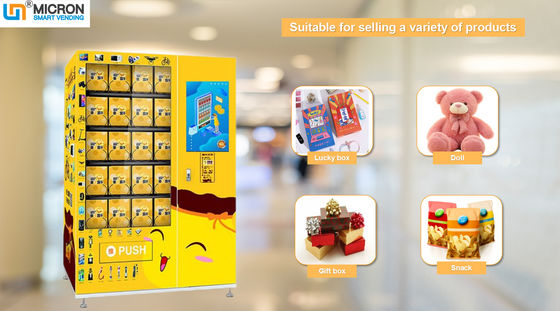 Alışveriş merkezinde reklam yönetimi olan şanslı kutu ve hediye otomatik satış makinesi